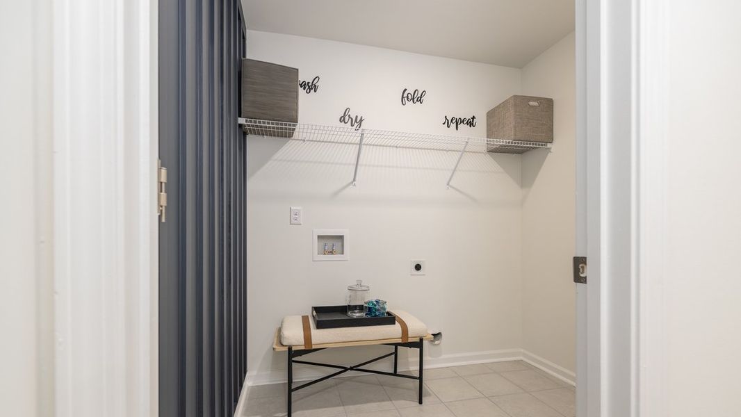 Representative furnished interior of a home built from the Knollwood by D.R. Horton in Benteen Reserve, Atlanta (Image 20).