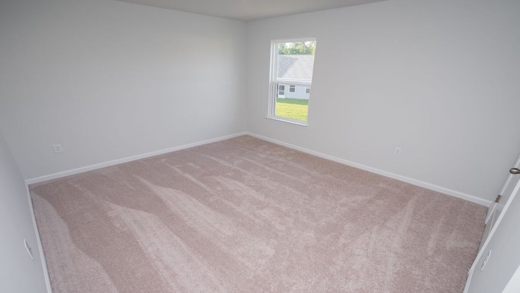 Spacious, unfurnished interior of a new home in Cedar Hill Landing, Navassa (Image 27).