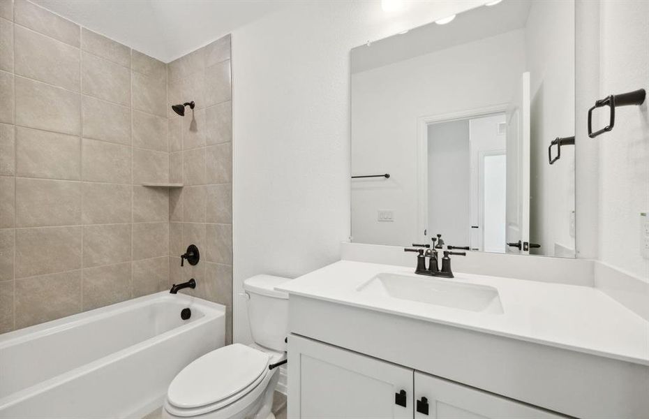 Upgraded secondary bathroom*real home pictured