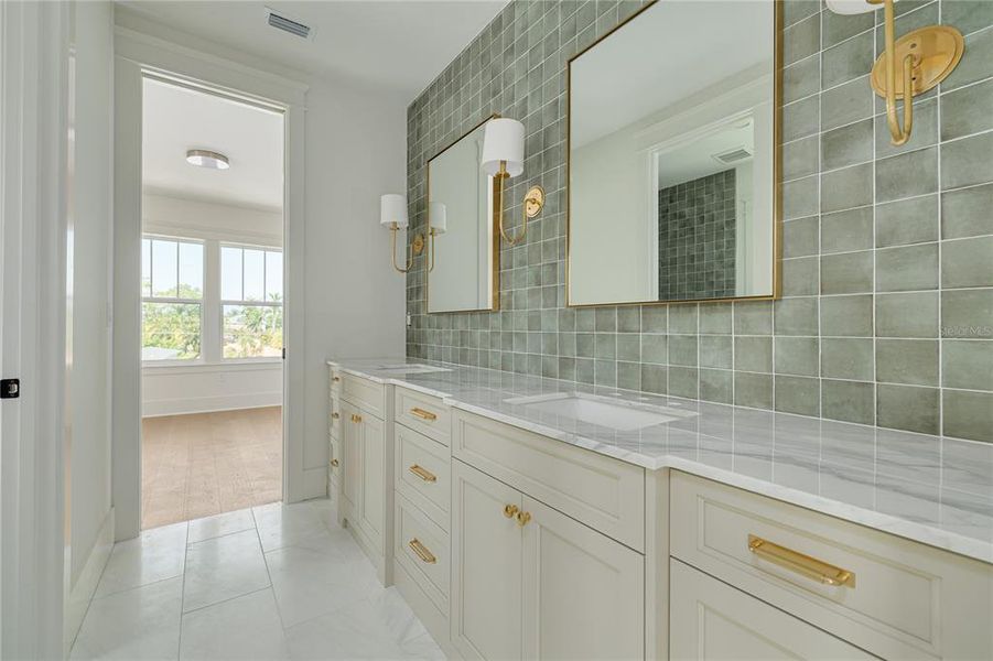 Bathroom #3 is a shared jack-and-jill bathroom between bedrooms #3 & #4.