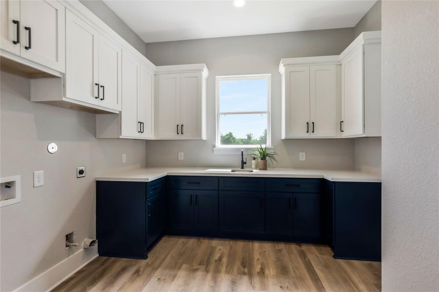 Expansive utility room with abundant storage solutions.