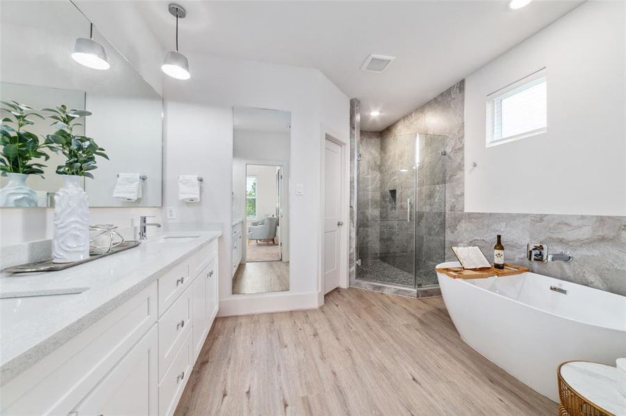 The Remarkable Owner's Bathroom Adds A Major Wow Factor With Upscale Finishes. Massive Walk In Closet Is Connected. Double Sink Vanity Gives Space And Organization. Decorative Tile And Upscale Fixtures Grace Each Of The Home's Designer Bathrooms.