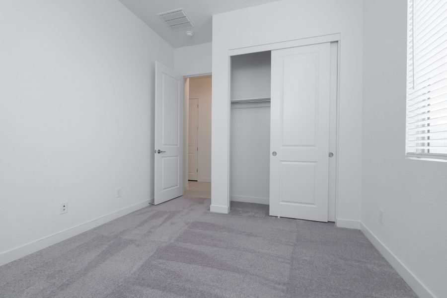 Spacious, unfurnished interior of a new home in Soleo, San Tan Valley (Image 27).