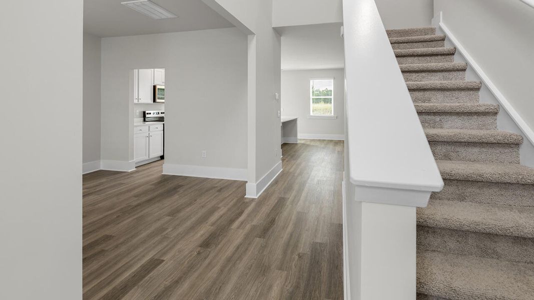 Representative unfurnished interior of a home built from the FORRESTER by D.R. Horton in The Preserve at Tidewater, Sneads Ferry (Image 15).