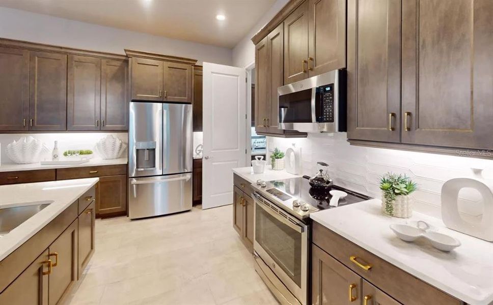 Furnished interior view inside a new home in Plantation Bay, Ormond Beach (Image 9).