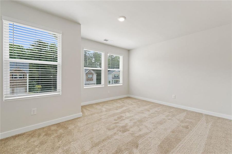 Spacious, unfurnished interior of a new home in Fern Dale, Fairburn (Image 24).