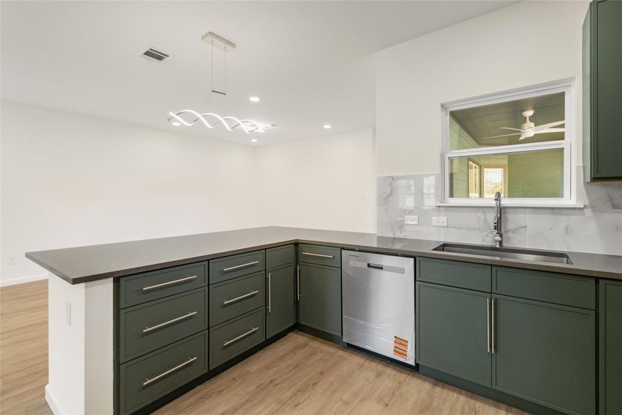 Modern finishes and clean lines elevate everyday cooking and dining.