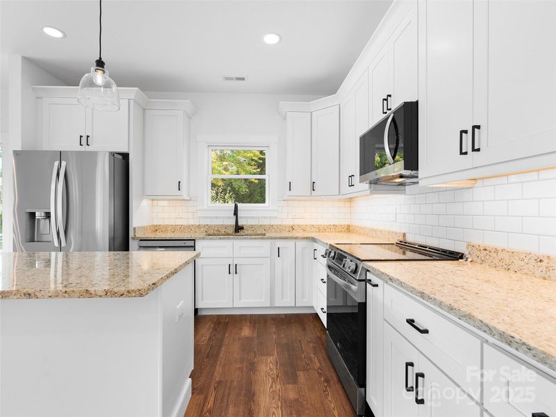 Furnished interior view inside a new home in , Waynesville (Image 8).