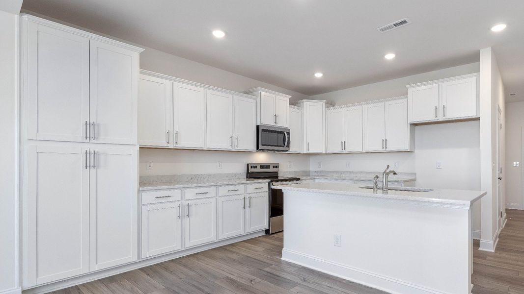 Furnished interior view inside a new home in Sidney Creek Townhomes, Zebulon (Image 7).