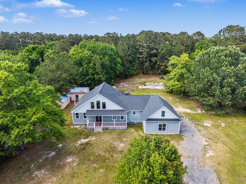 Front exterior of a new home in , Moncks Corner, SC, highlighting curb appeal (Image 19).