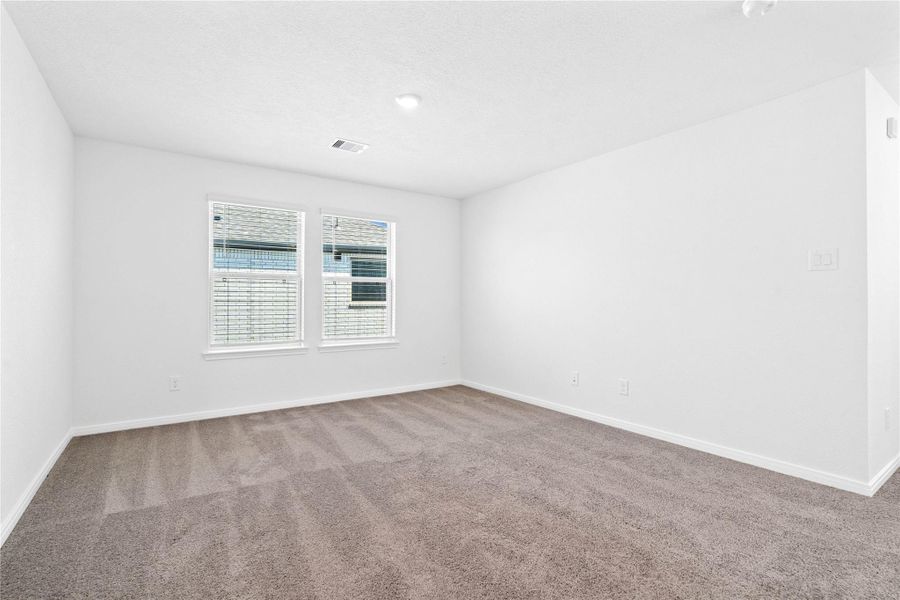 Enjoy the Loft—an additional living area perfect for a game room, media space, or a peaceful retreat. Featuring, recessed lighting, large windows with privacy blinds, and plush carpeting.