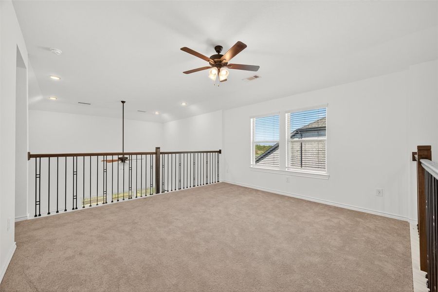 Spacious, unfurnished interior of a new home in Sunterra, Katy (Image 24).