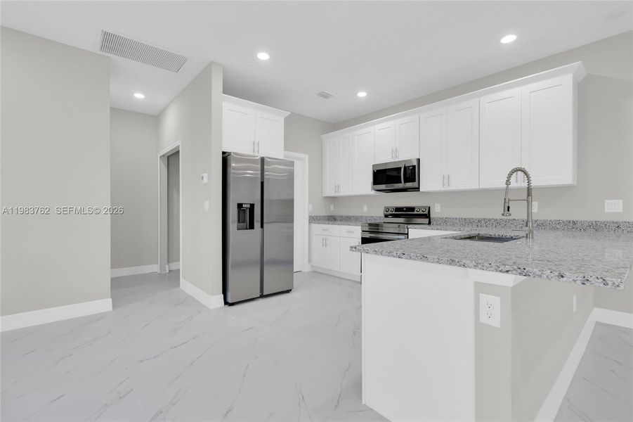 Furnished interior view inside a new home in , Lehigh Acres (Image 8).