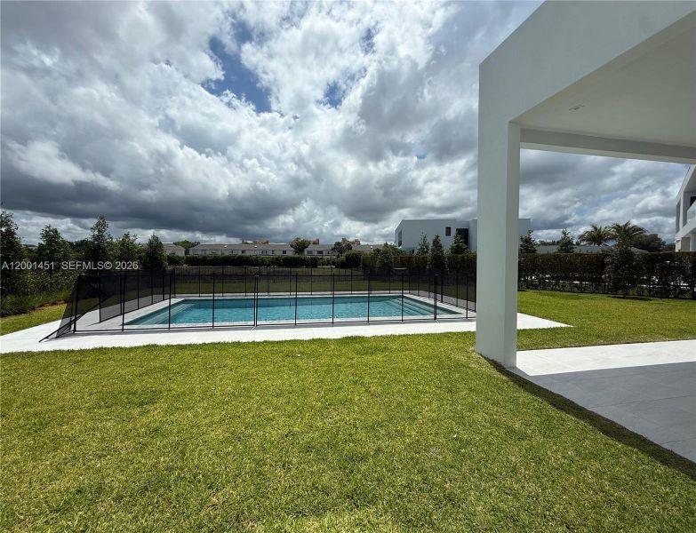 Exterior details and patio area of a home in , Weston (Image 18).