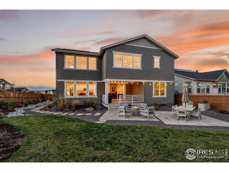 Backyard at twilight - space to gather, relax, and enjoy evenings outdoors.