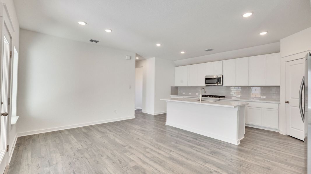 Furnished interior view inside a new home in Creeks Crossing, Elgin (Image 6).