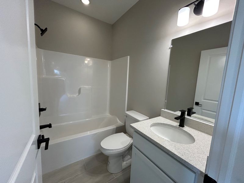 Furnished interior view inside a new home in Mystic Ridge, Whitmore Lake (Image 12).