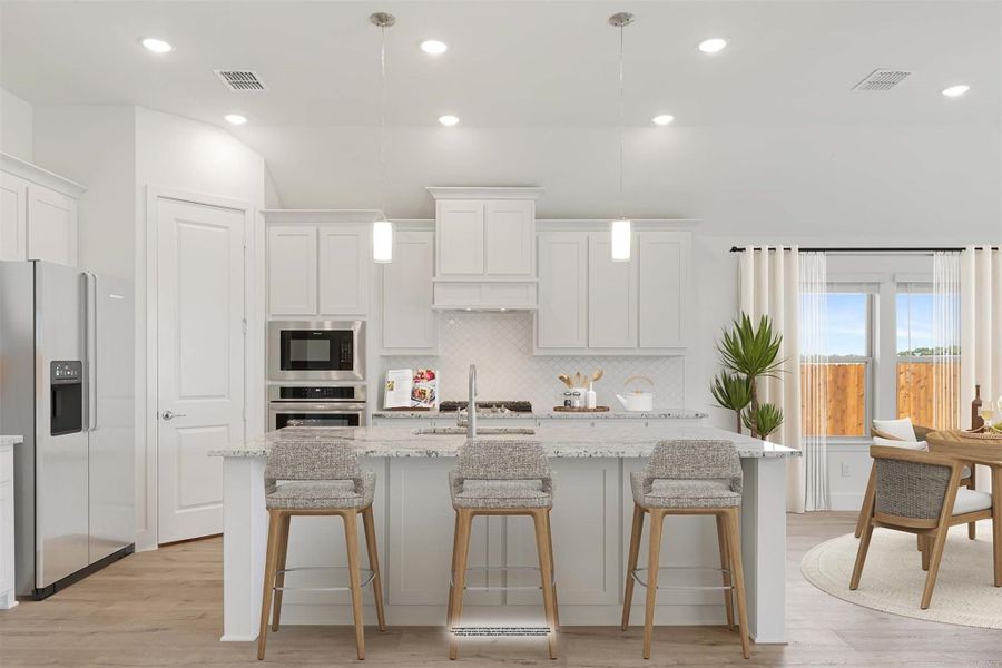 Kitchen with white cabinets, granite island, three bar stools, stainless appliances, and pendant lights over hardwood floors Kitchen with white cabinets, granite island, three bar stools, stainless appliances, and pendant lights over hardwood floors