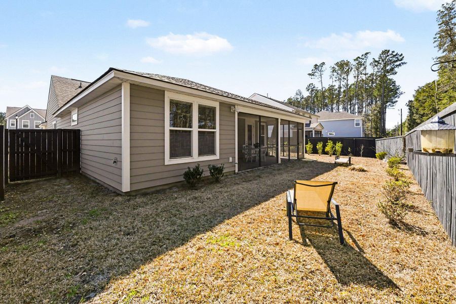 Exterior details and patio area of a home in , Johns Island (Image 28).