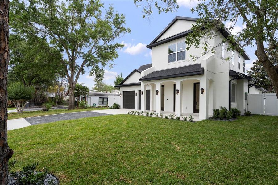 Front exterior of a new home in , Winter Park, FL, highlighting curb appeal (Image 27).