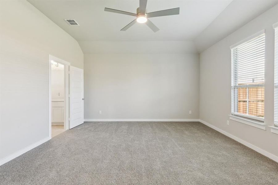 Primary Suite in the Stanley II home plan by Trophy Signature Homes – REPRESENTATIVE PHOTO