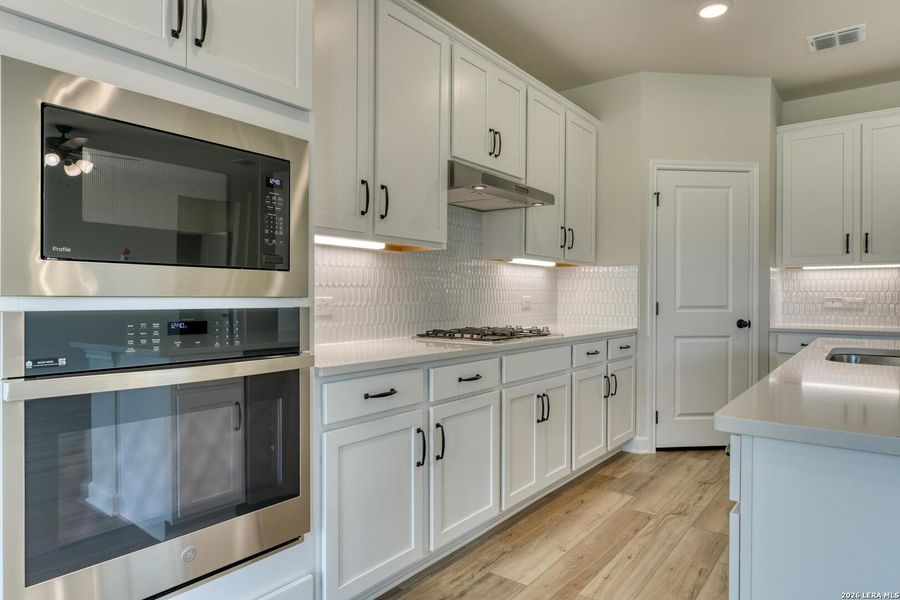 Furnished interior view inside a new home in Hennersby Hollow, San Antonio (Image 9).