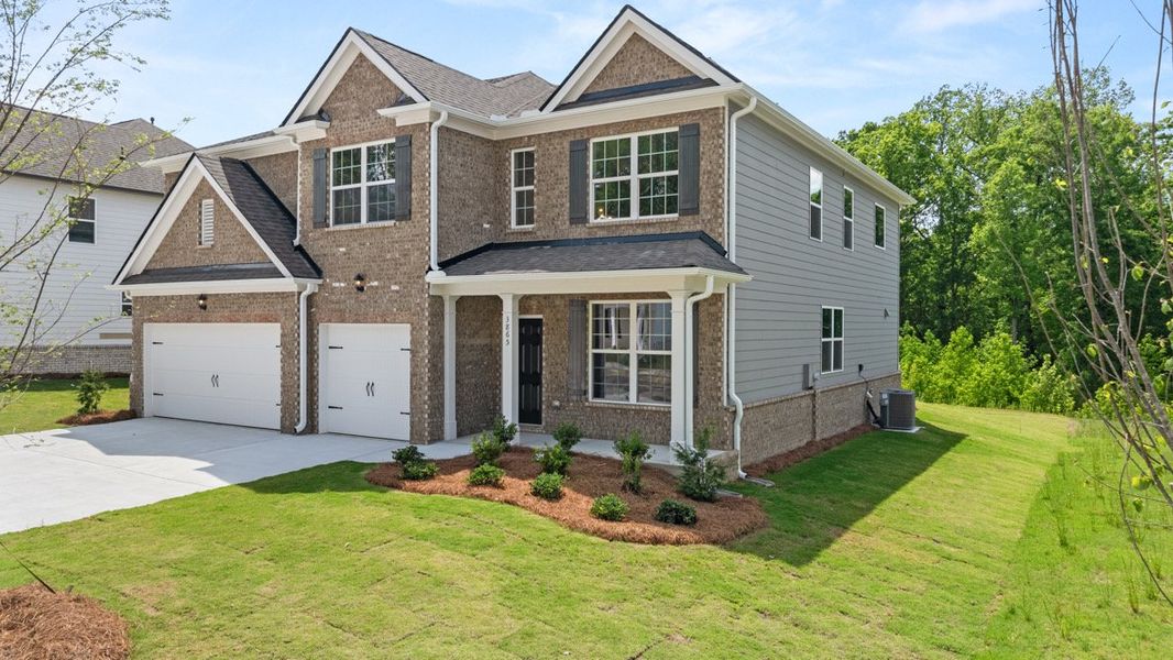 Representative exterior photo of a completed home built from the GRAYSON by D.R. Horton in Butner Estates, South Fulton, GA (Image 2).