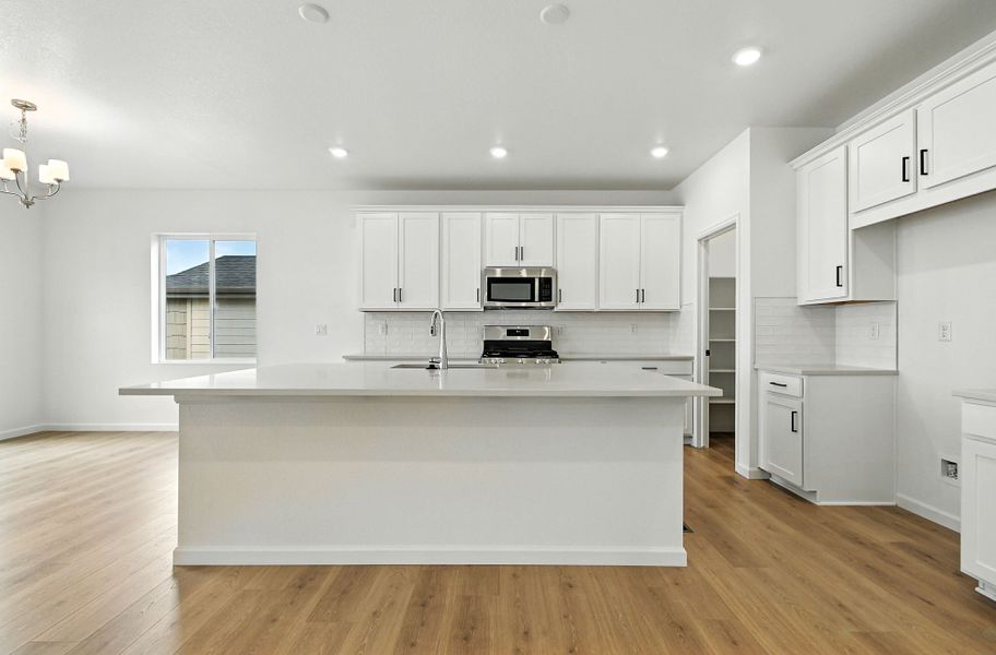 Furnished interior view inside a new home in Trailstone, Arvada (Image 8).