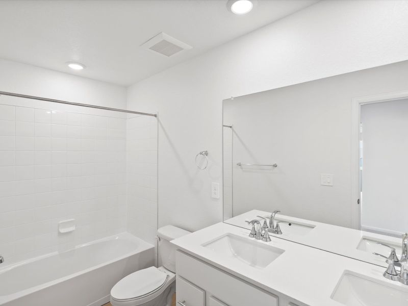 Furnished interior view inside a new home in Paint Brush Hills, Peyton (Image 7).