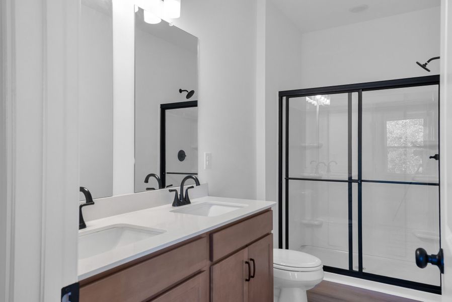 Large walk in shower and dual vanities Large walk in shower and dual vanities