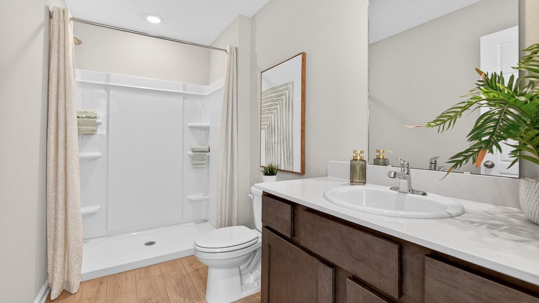 Representative furnished interior of a home built from the BRADFORD by D.R. Horton in Liberty Cove, Yulee (Image 14).
