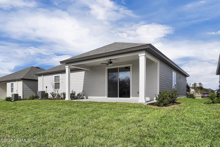 Front exterior of a new home in Jennings Farm, Middleburg, FL, highlighting curb appeal (Image 2).