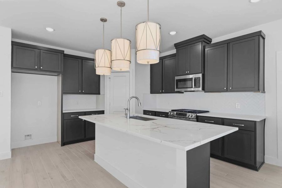 Representative furnished interior of a home built from the Springfield by Chesmar Homes in Bridgeland, Elgin (Image 6).