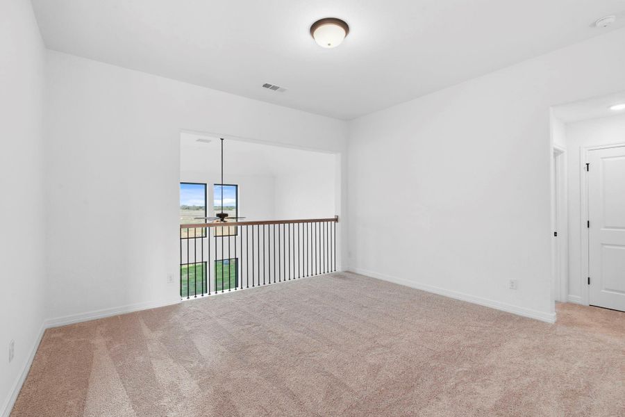 Spacious, unfurnished interior of a new home in Brookewater, Rosenberg (Image 28).