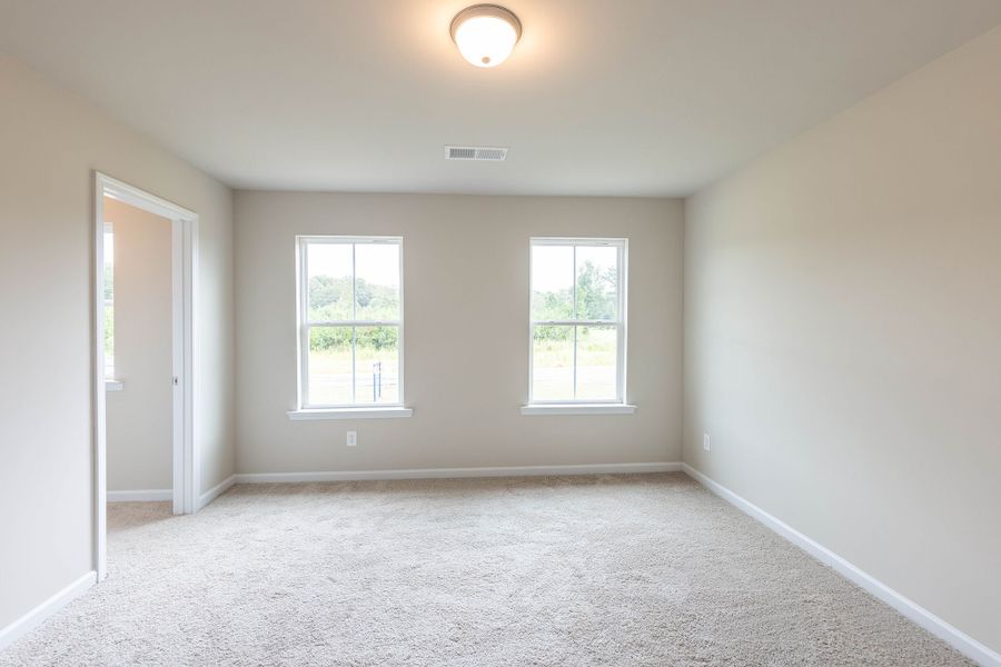 Bedroom #3 with lots of natural light located upstairs