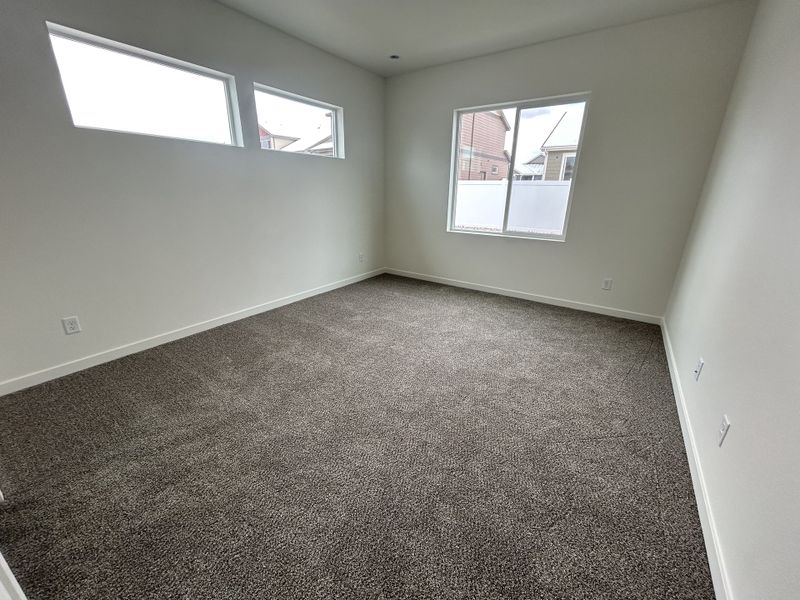 Spacious, unfurnished interior of a new home in Union Colony West, Greeley (Image 23).