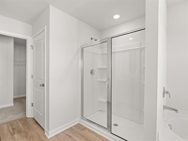 Spacious, unfurnished interior of a new home in Waypoint, Flowery Branch (Image 26).