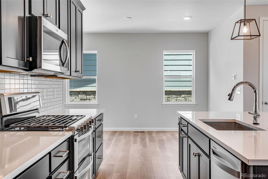 Furnished interior view inside a new home in Crescendo at The Aurora Highlands, Aurora (Image 3).