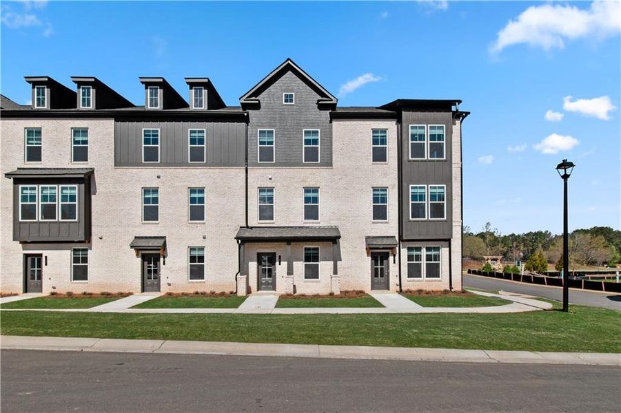 Front exterior of a new home in Daybreak, Newnan, GA, highlighting curb appeal (Image 25).
