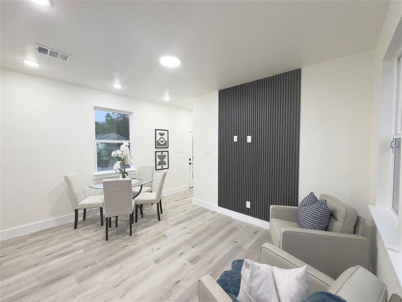 Dining space featuring light wood-type flooring