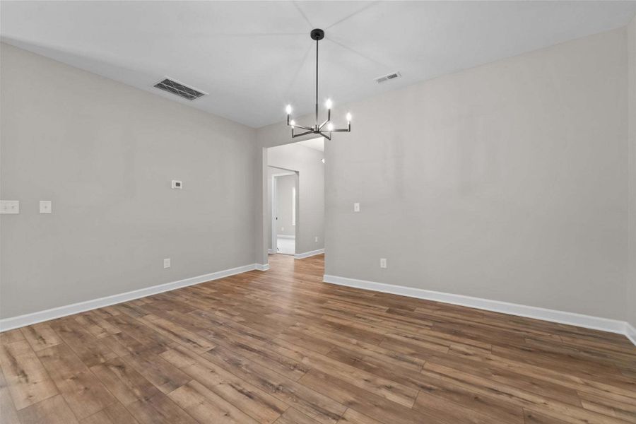 Representative unfurnished interior of a home built from the Weymouth by Caviness & Cates Communities in Bartlett Manor, Youngsville (Image 109).