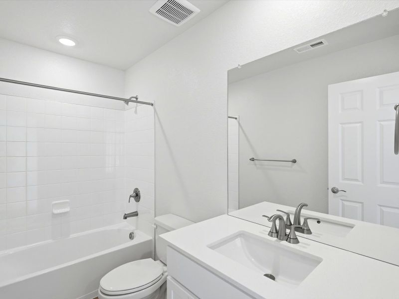 Furnished interior view inside a new home in Three Hills, Morrison (Image 8).