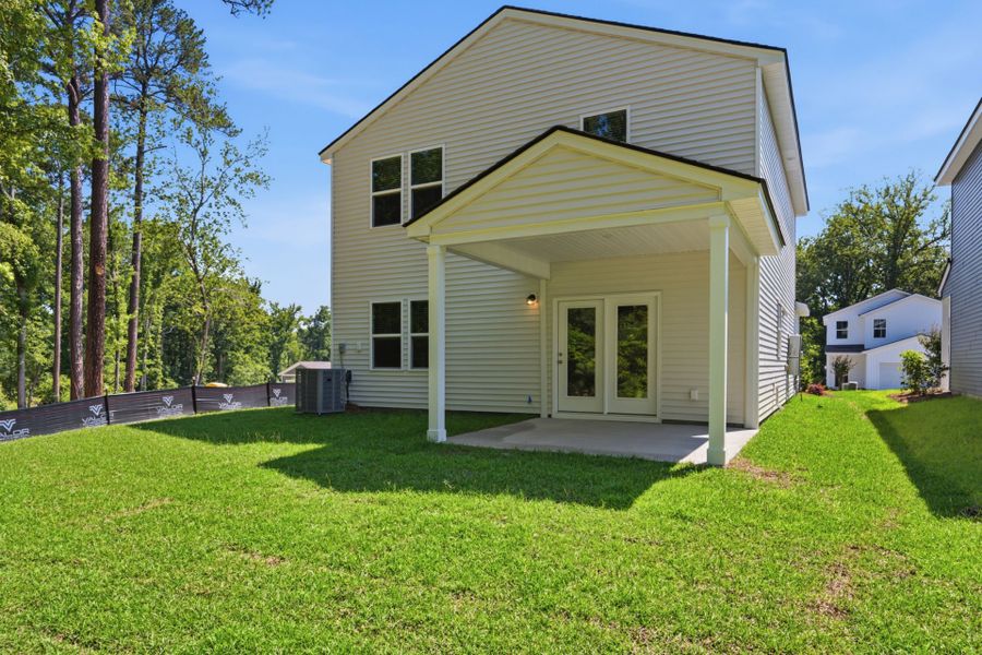 Exterior details and patio area of a home in Grand Arbor, Blythewood (Image 3).