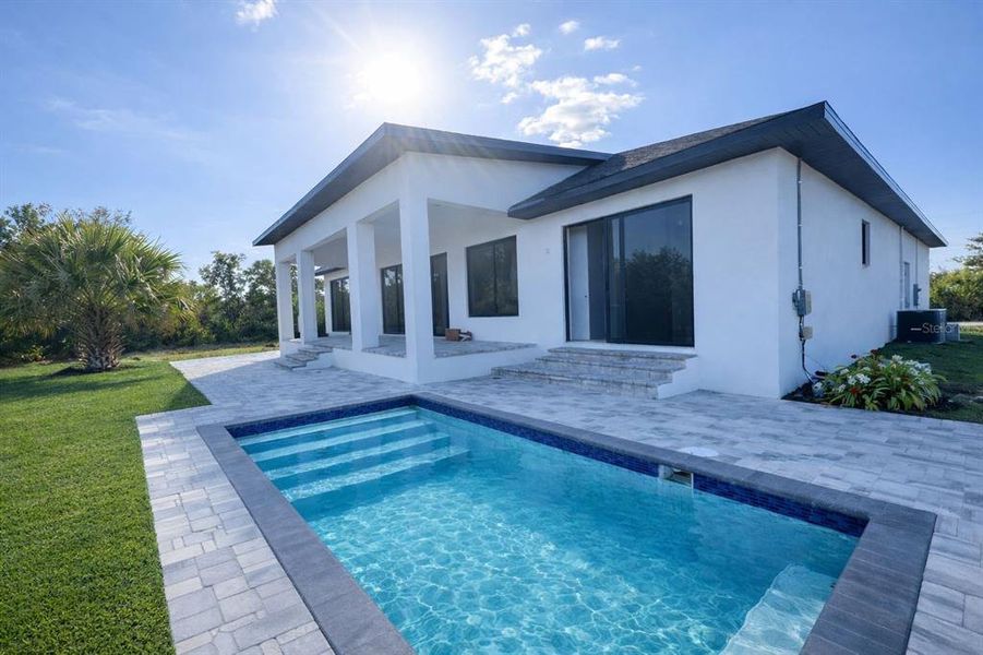 Exterior details and patio area of a home in , Port Charlotte (Image 15).