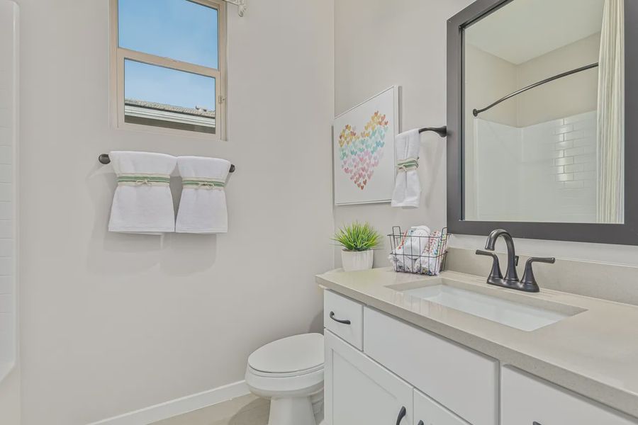 Representative furnished interior of a home built from the 1901 by Elliott Homes in Camilo at Santana, Yuma (Image 17).