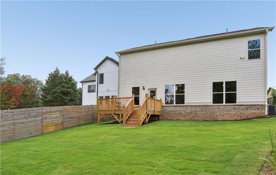 Exterior details and patio area of a home in , Flowery Branch (Image 27).