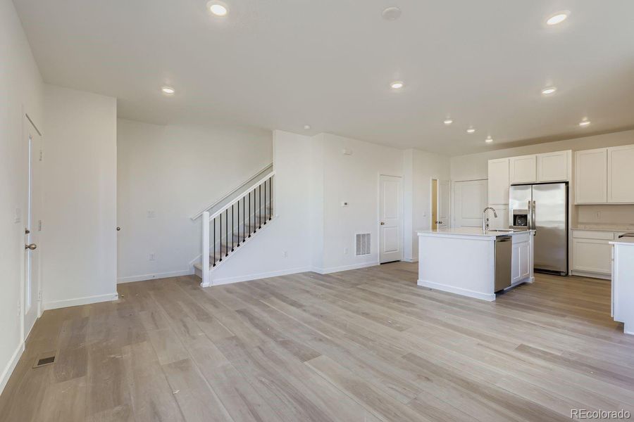 Spacious, unfurnished interior of a new home in Parterre: The Parkside Collection, Thornton (Image 9).