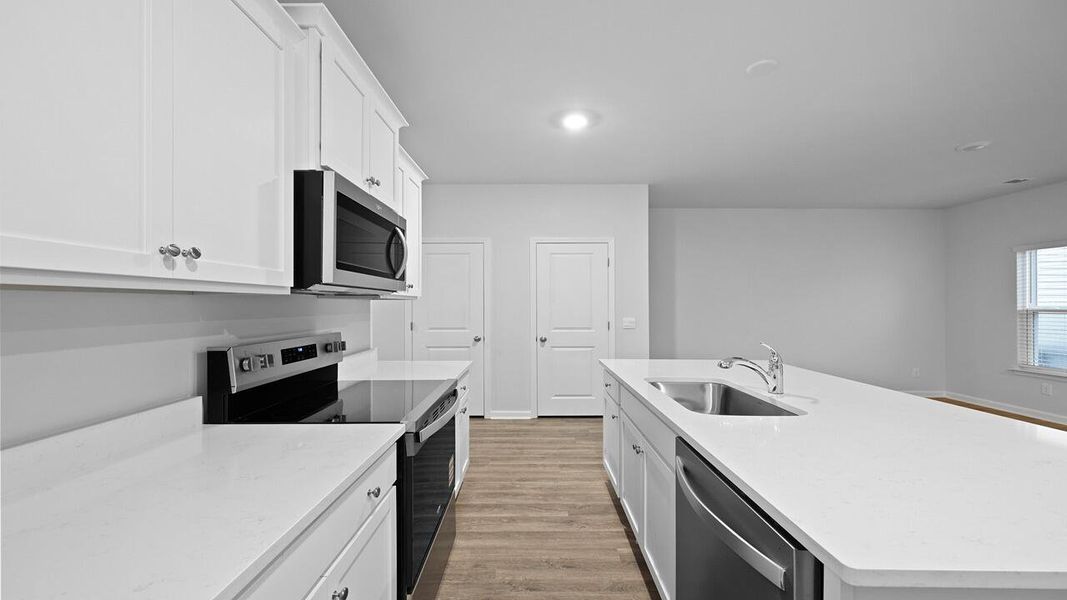 Furnished interior view inside a new home in Garbon Fields, Summerville (Image 8).