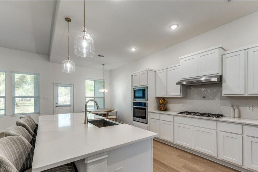 Furnished interior view inside a new home in Deer Pines, Conroe (Image 12).
