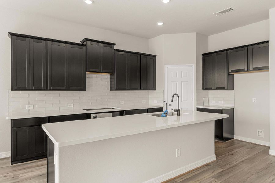 Kitchen. Note: Sample product photo - actual exterior and interior selections may vary by homesite